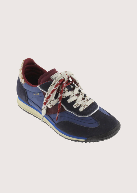 A low-top fashion sneaker, featuring navy blue suede and mesh panels, burgundy accents, patterned white and burgundy laces, and a cream midsole, shown against a plain light gray background.