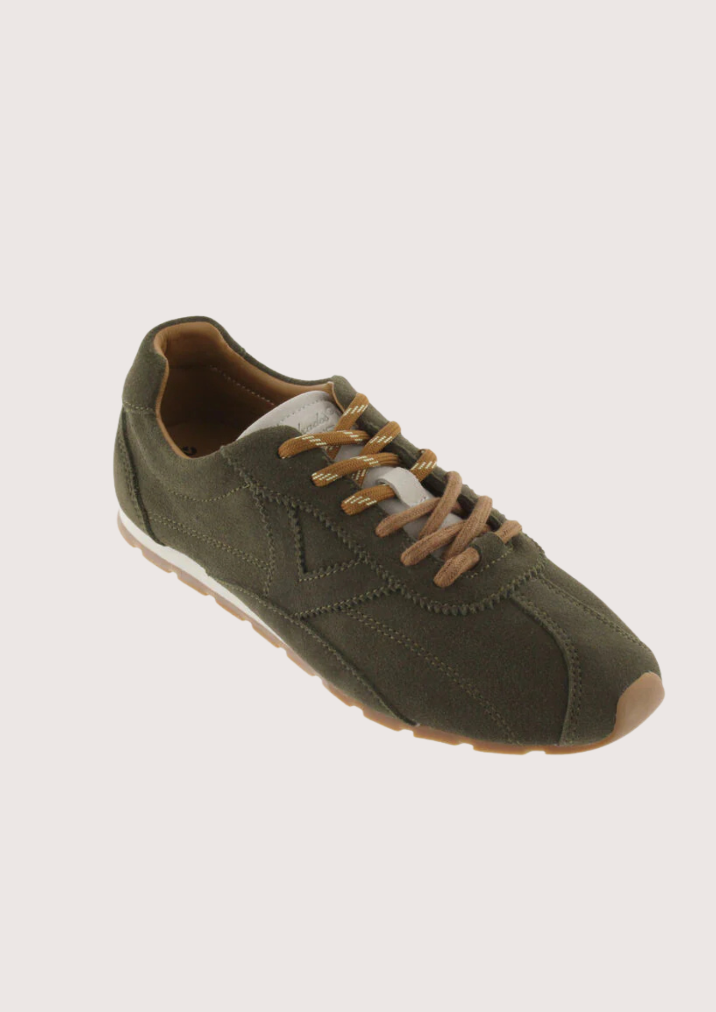 Khaki suede sneaker with beige sole on a plain background
