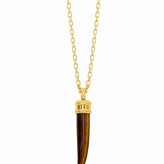 A gold chain necklace featuring a pendant made from a polished tiger's eye or tortoiseshell bone with a gold cap, displayed on a clean white background.