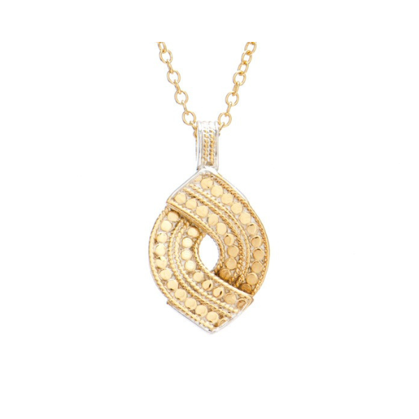 Gold chain with gold woven pendant with small gold plated dots