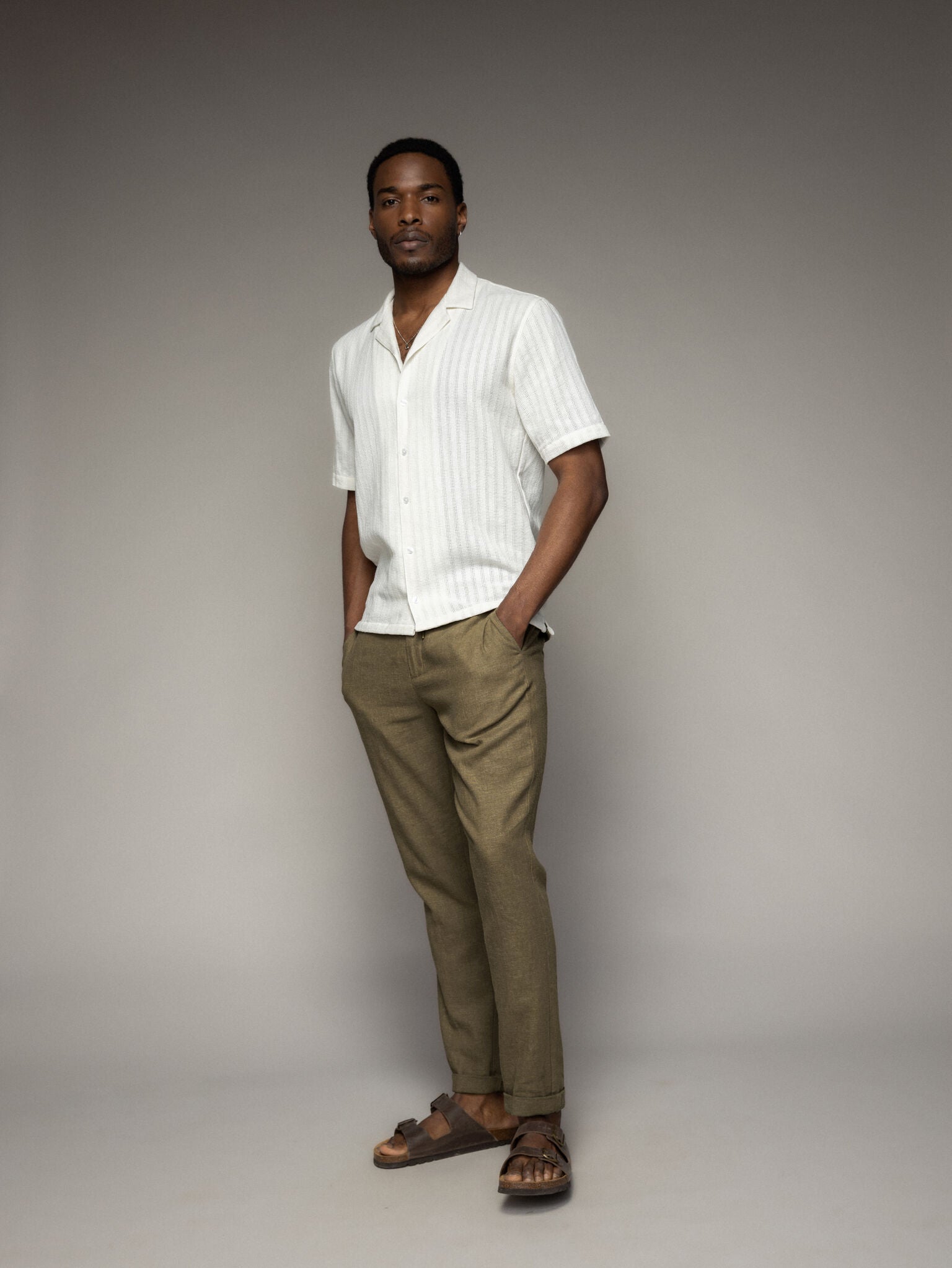 Cream shirt worn with khaki trouser on model