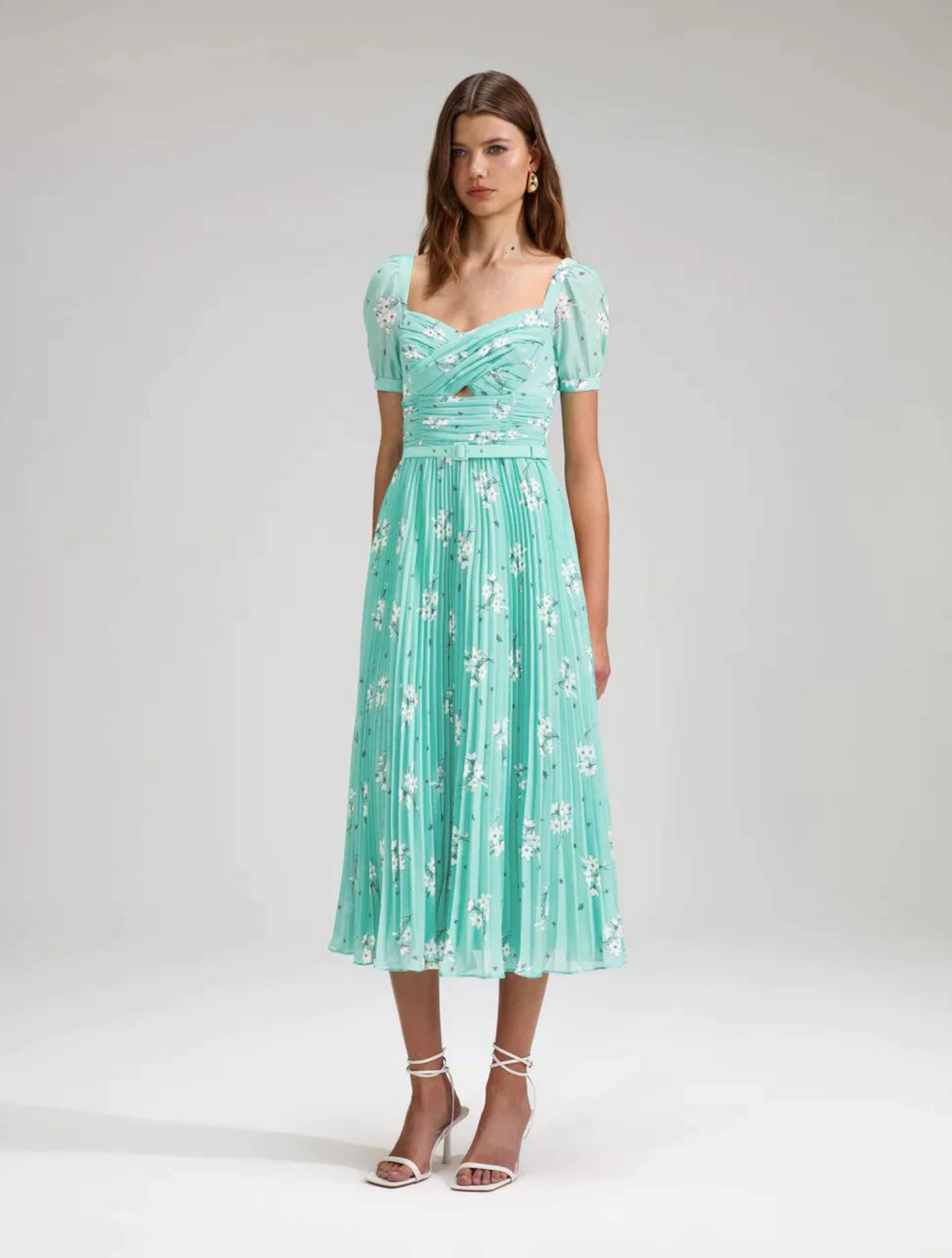 Aqua chiffon midi dress with short sleeves and pleated skirt with all over ivory floral print