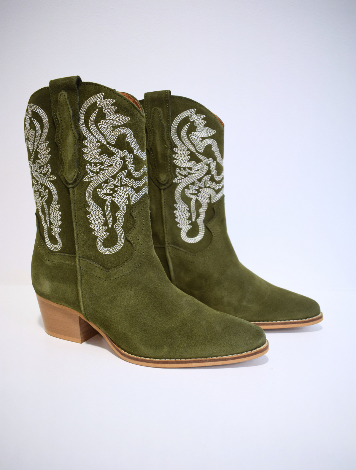 Army green cowboy boot with contrast stitching