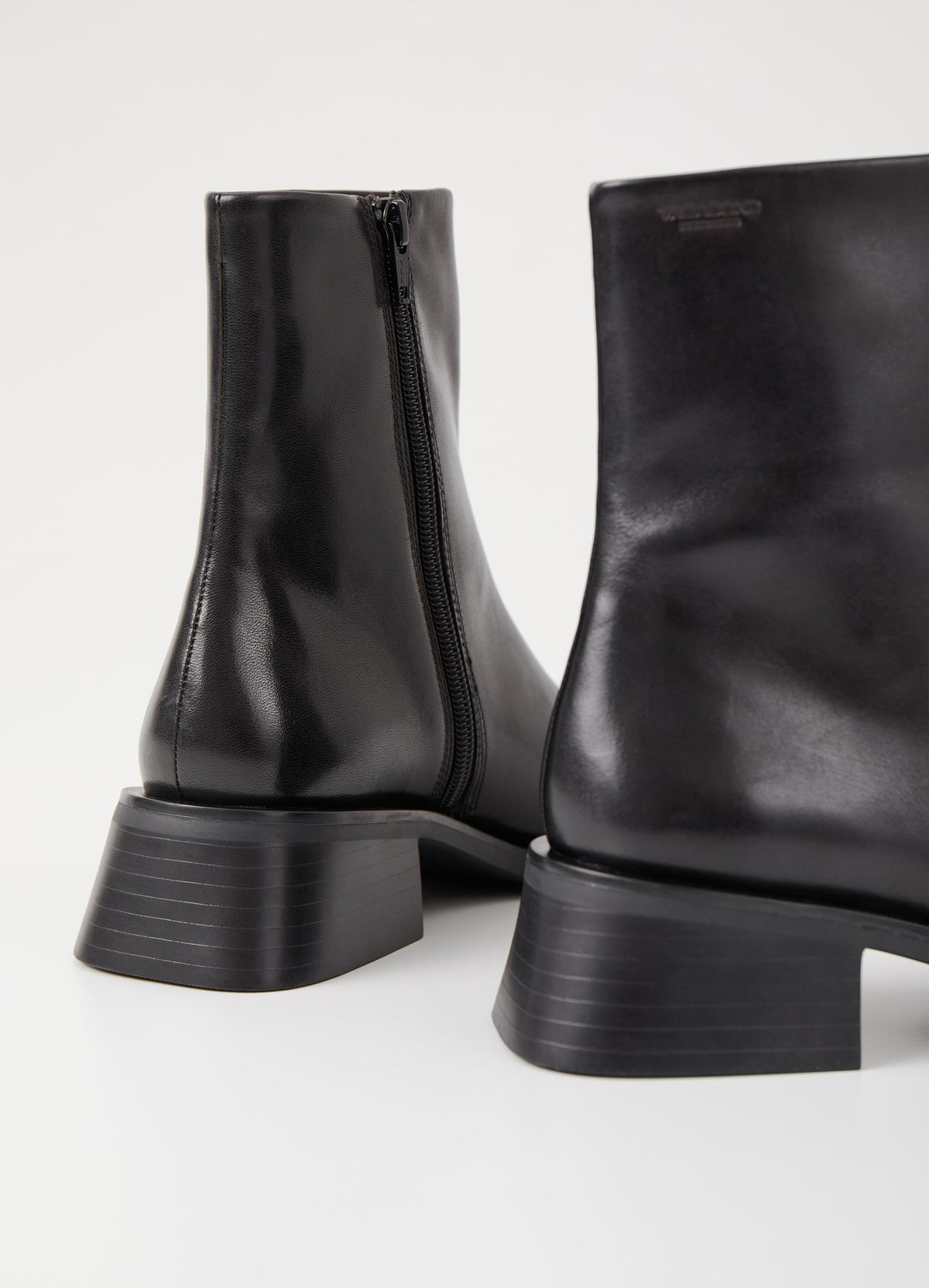 Black short leather boot with flared block stacked heel