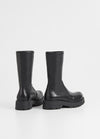Chunky pull on black leather sock boot with chunky sole and heel