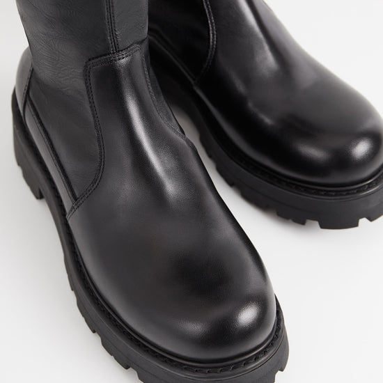 Chunky pull on black leather sock boot with chunky sole and heel