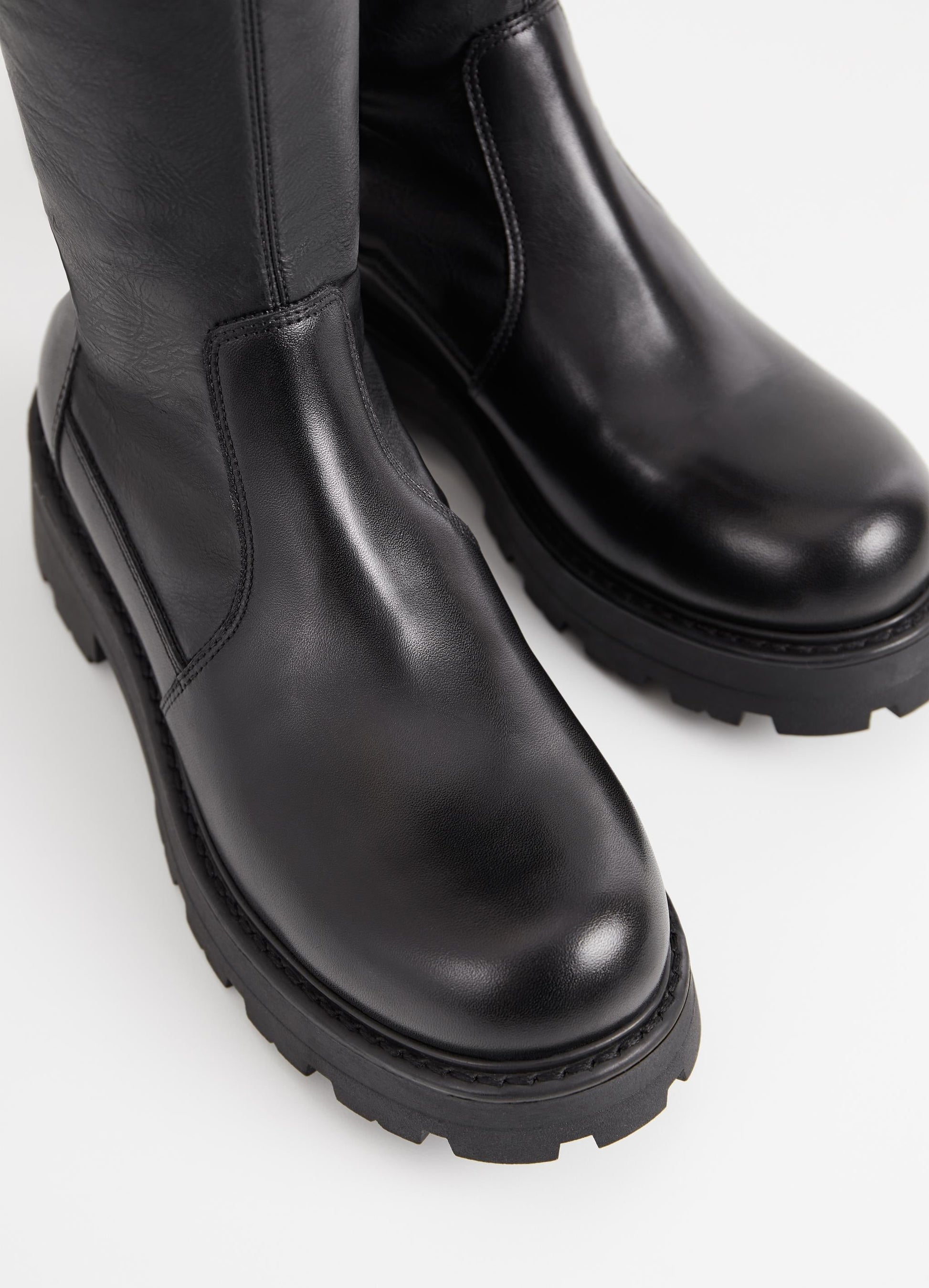 Chunky pull on black leather sock boot with chunky sole and heel