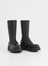 Chunky pull on black leather sock boot with chunky sole and heel