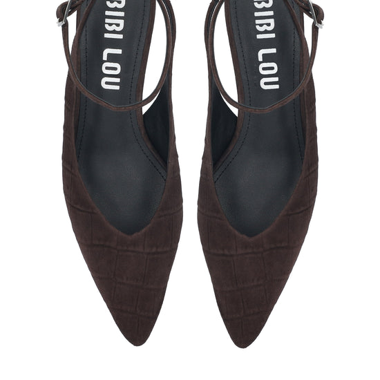 A pair of dark brown pointed-toe slingback flats with an embossed crocodile pattern, shown from a top-down view on a white background. The brand name 'BIRI LOU' is printed in white on the black insoles.