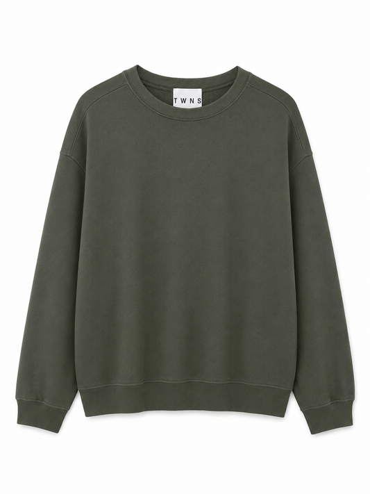 An oversized crewneck sweatshirt in olive green, against a solid white background.