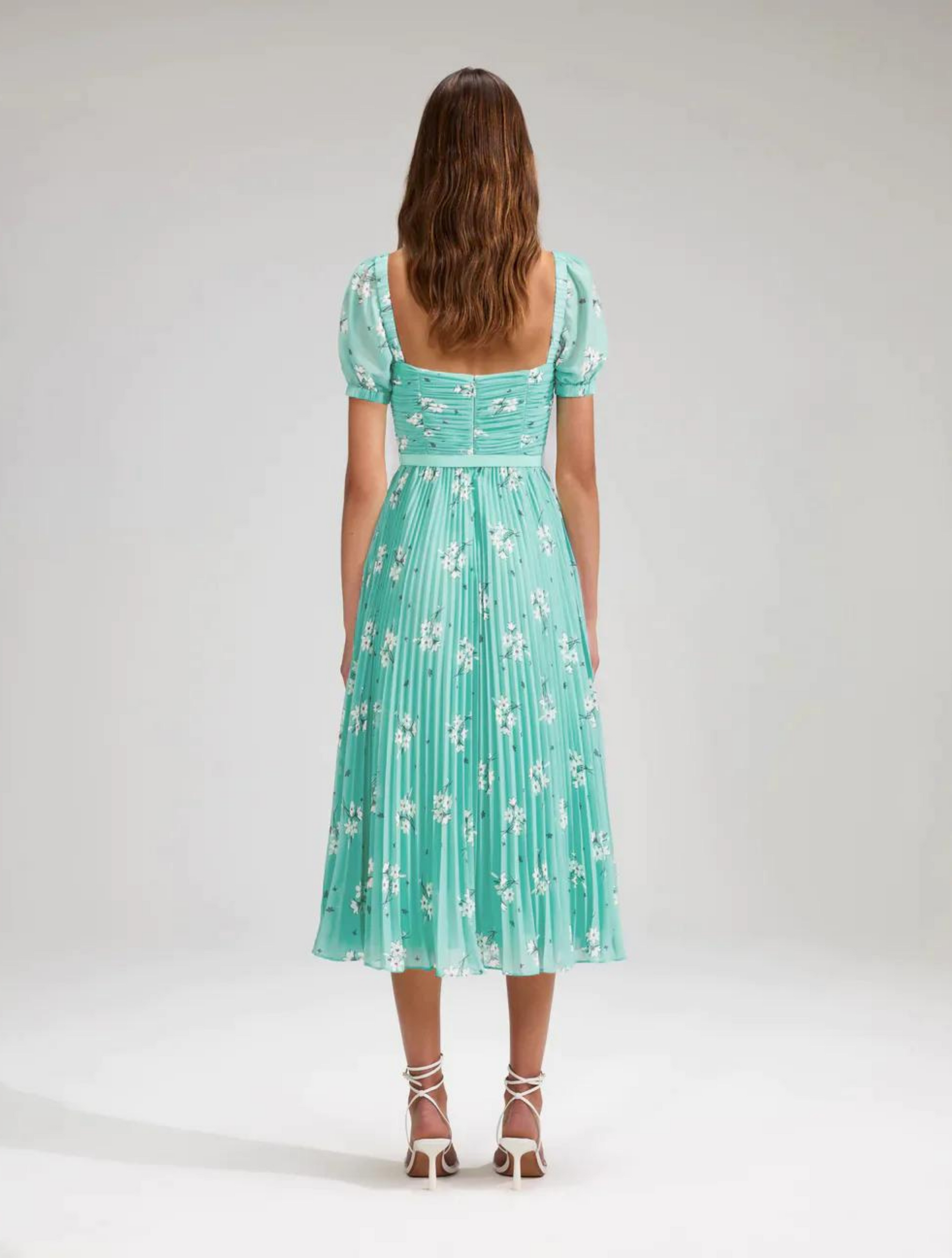 Aqua chiffon midi dress with short sleeves and pleated skirt with all over ivory floral print