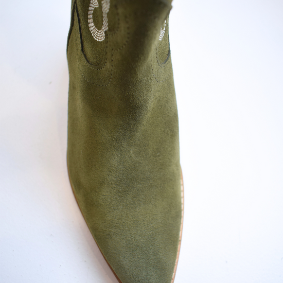 Army green cowboy boot with contrast stitching