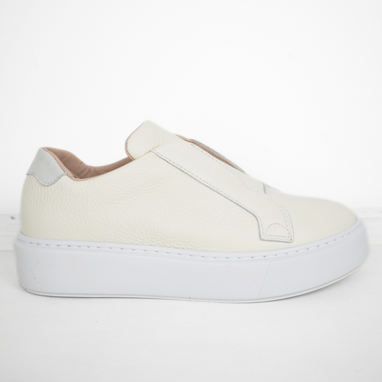 White platform trainers will elasticated side panels to make them easy to pull on