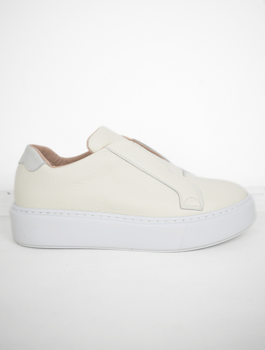 White platform trainers will elasticated side panels to make them easy to pull on