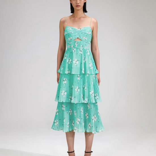 Aqua midi dress with spaghetti straps and pleated triple tiered skirt with small cut out in the bodice