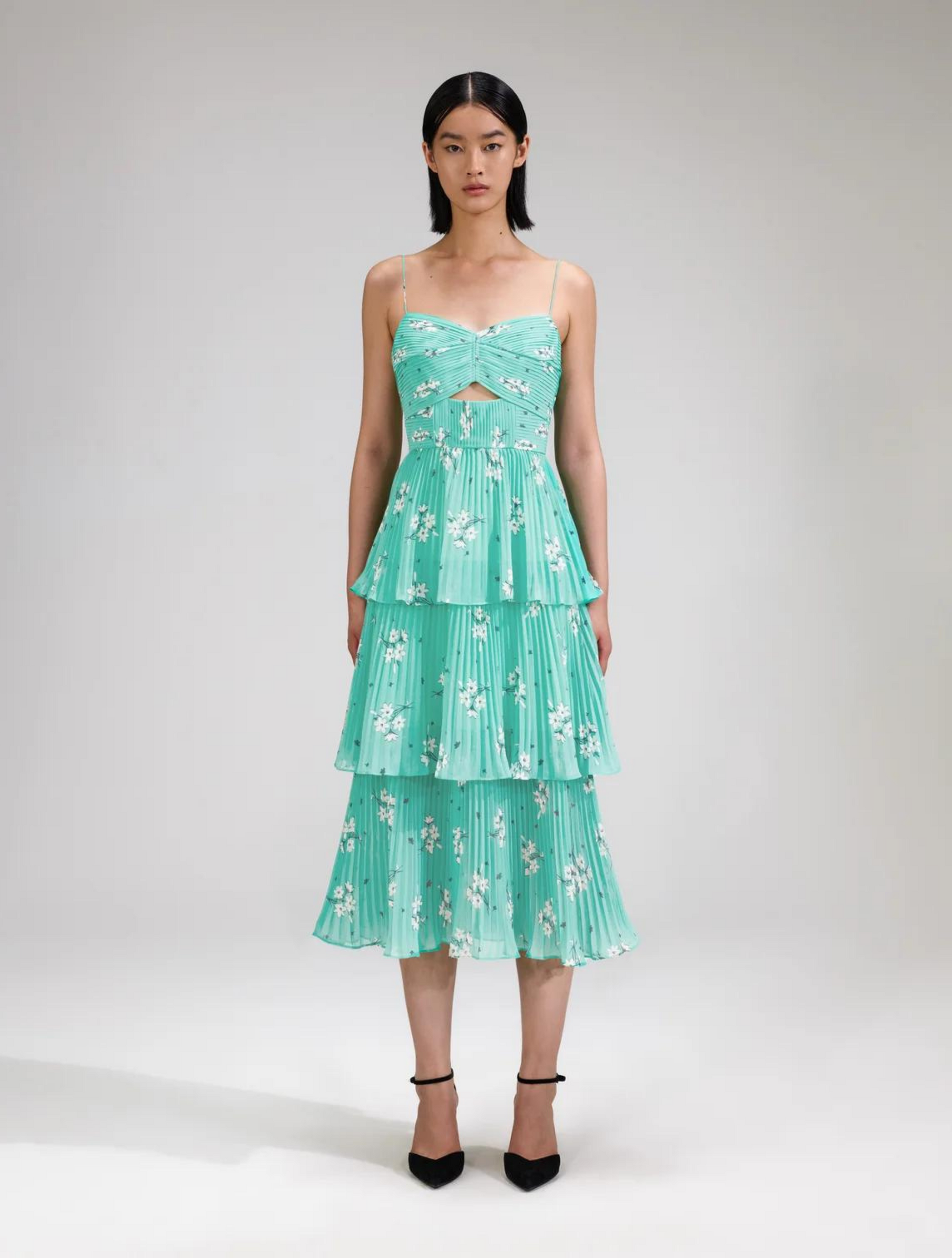 Aqua midi dress with spaghetti straps and pleated triple tiered skirt with small cut out in the bodice