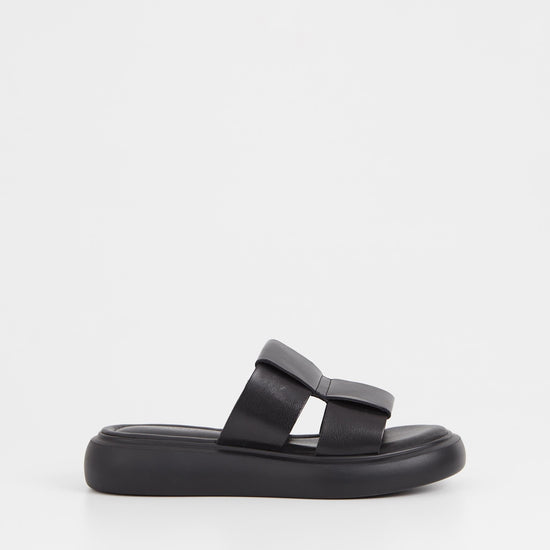 Black leather upper slider style sandal with a chunky black sole