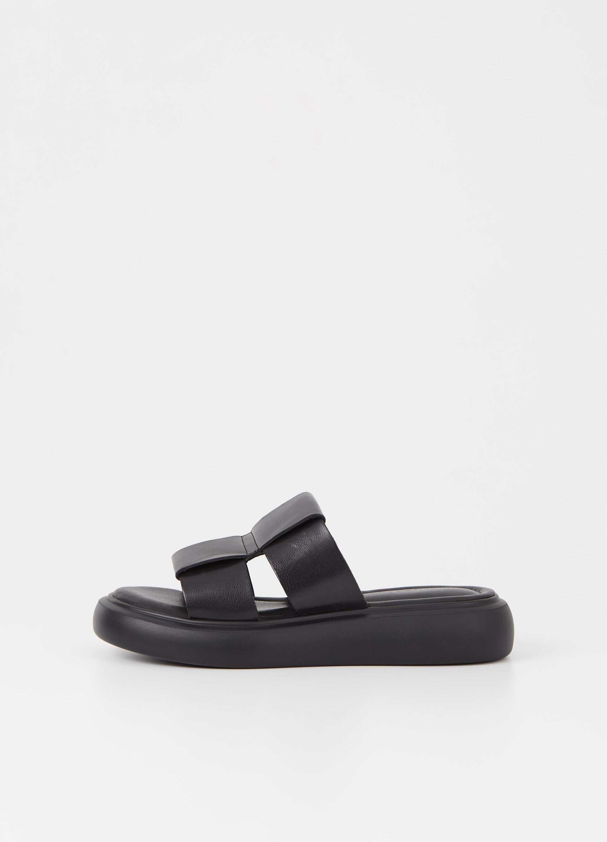 Black leather upper slider style sandal with a chunky black sole