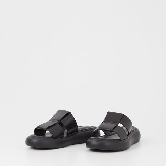 Black leather upper slider style sandal with a chunky black sole