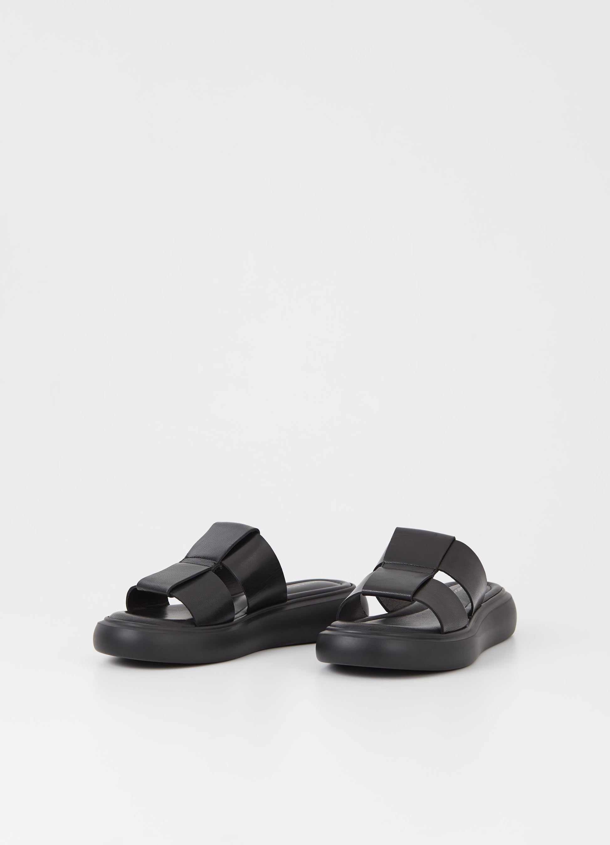 Black leather upper slider style sandal with a chunky black sole