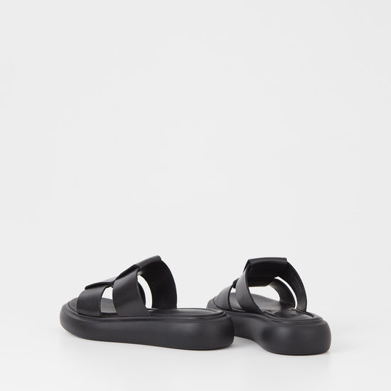 Black leather upper slider style sandal with a chunky black sole