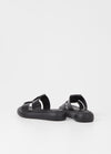 Black leather upper slider style sandal with a chunky black sole