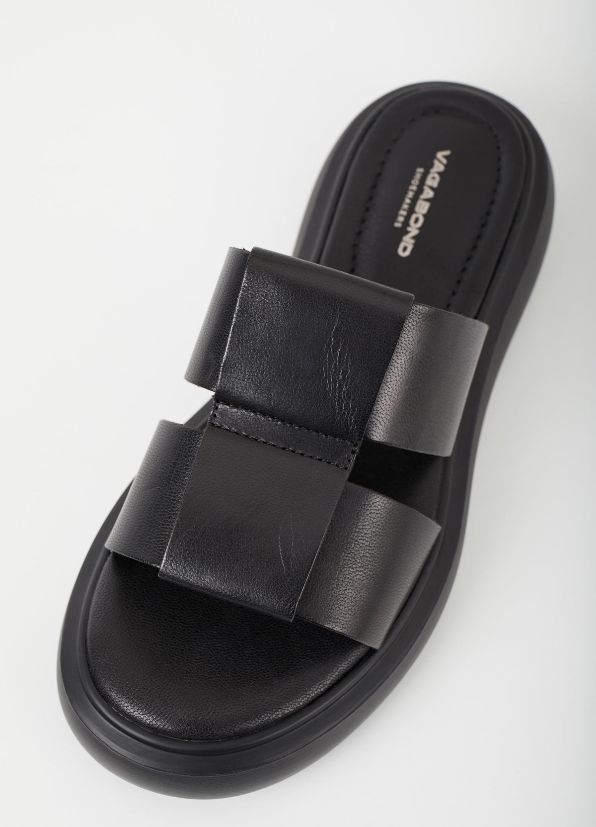 Black leather upper slider style sandal with a chunky black sole