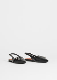 Black low slingbacks with silver buckle details