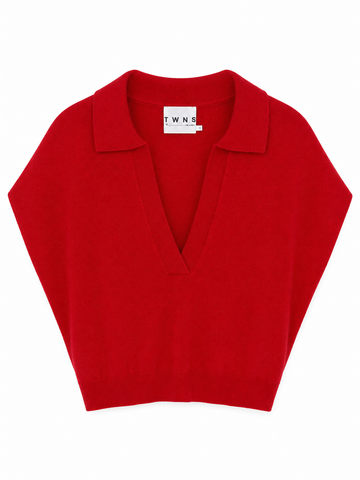 A bright red knit polo sweater with a V-neckline, laid flat against a solid white background.