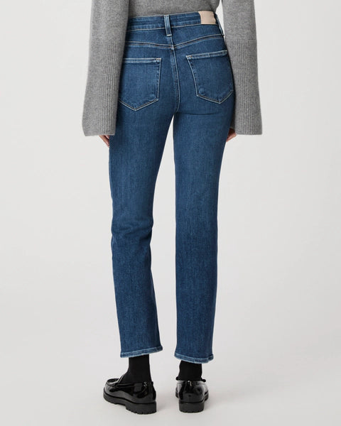 blue slim straight leg jeans with natural fading and slight ankle crop rear view 