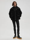 black oversized puffer with sherpa collar and 2 front flap pockets  model shot 