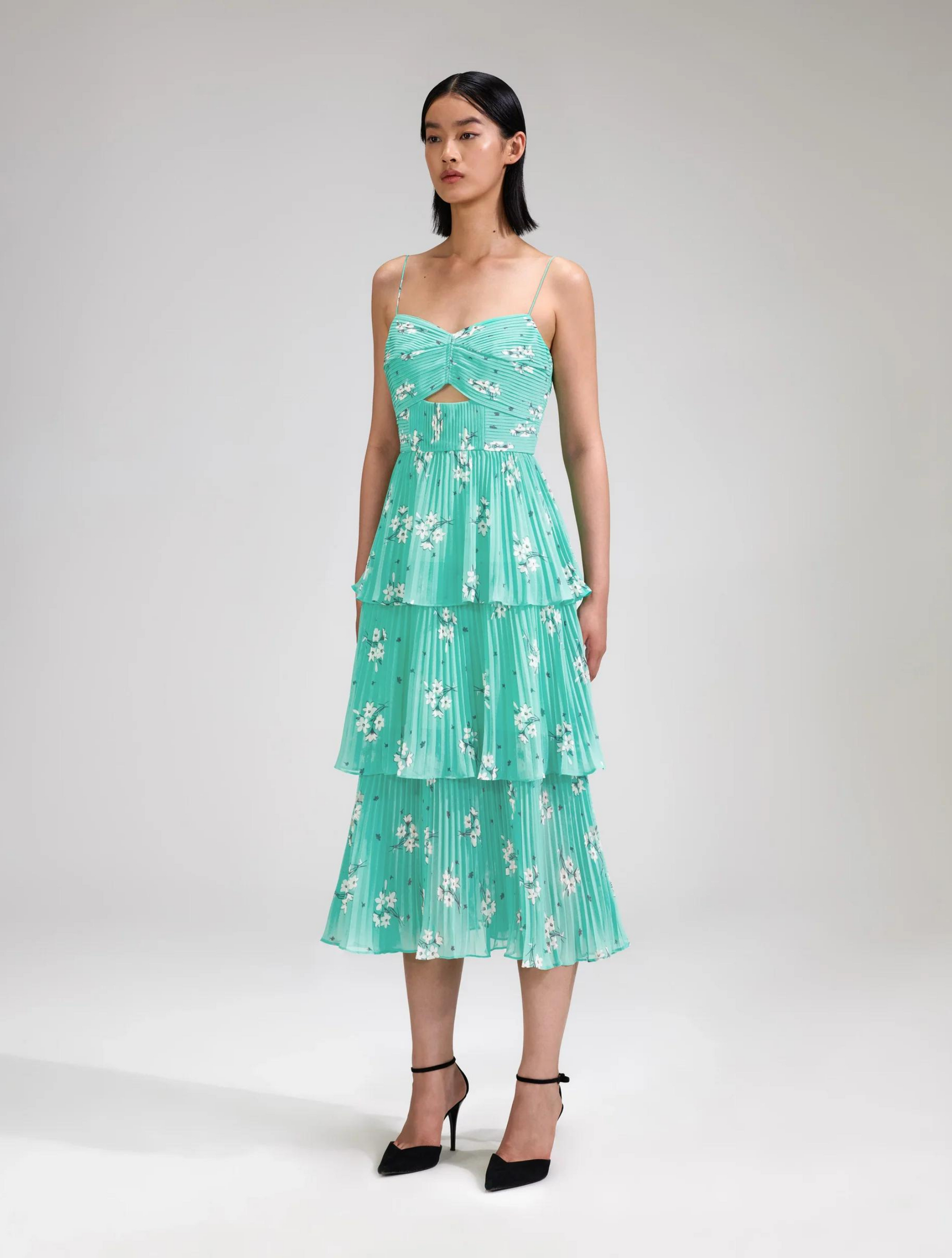 Aqua midi dress with spaghetti straps and pleated triple tiered skirt with small cut out in the bodice