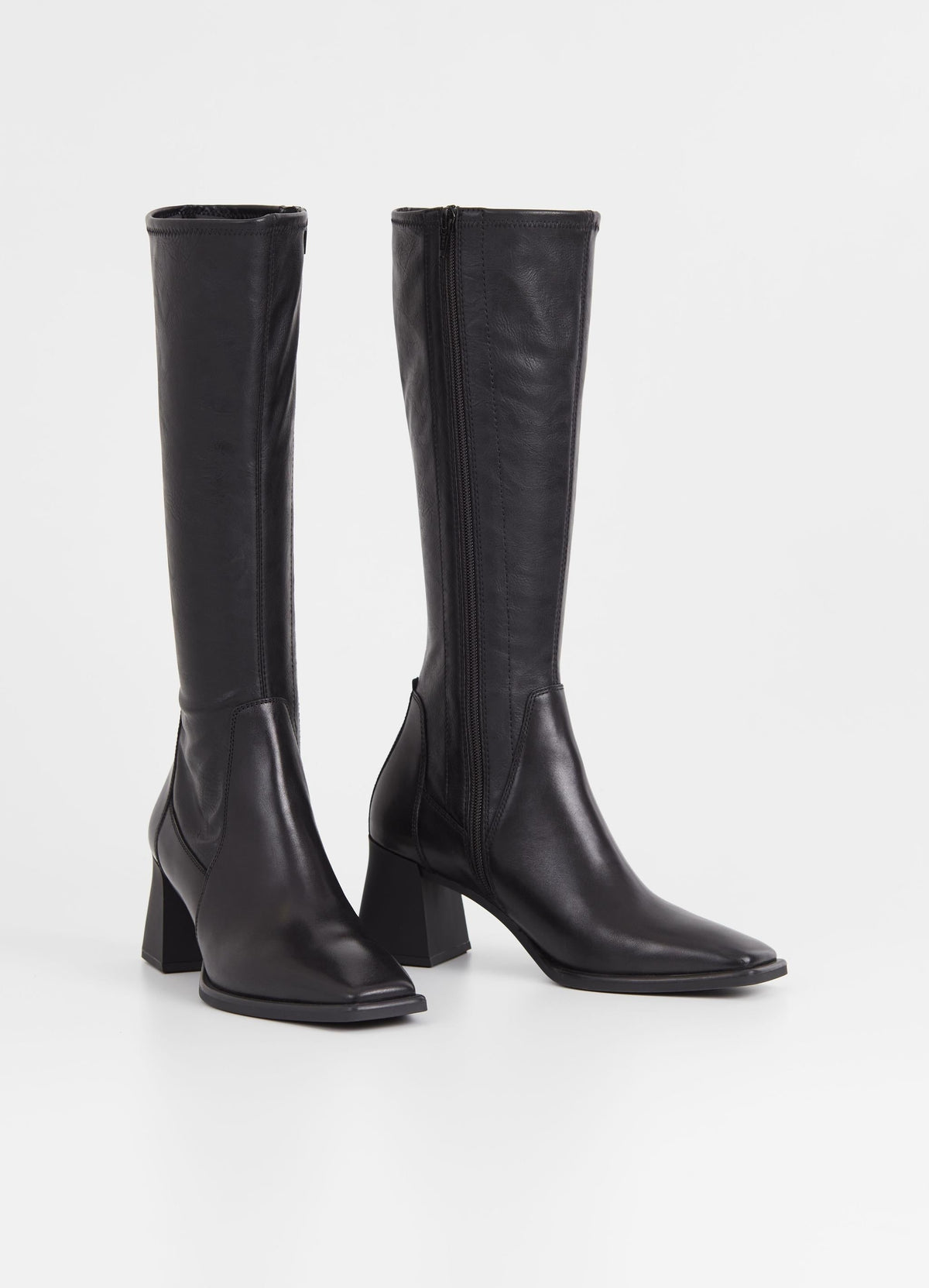 Tall black leather boot with flared block rubber heel and inside zip fastening