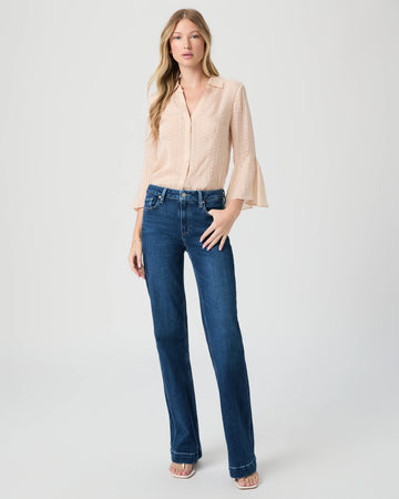 Blue jeans worn with cream blouse from Paige