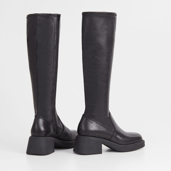 Tall leather and synthetic leather boots with moulded chunky sole and block heel