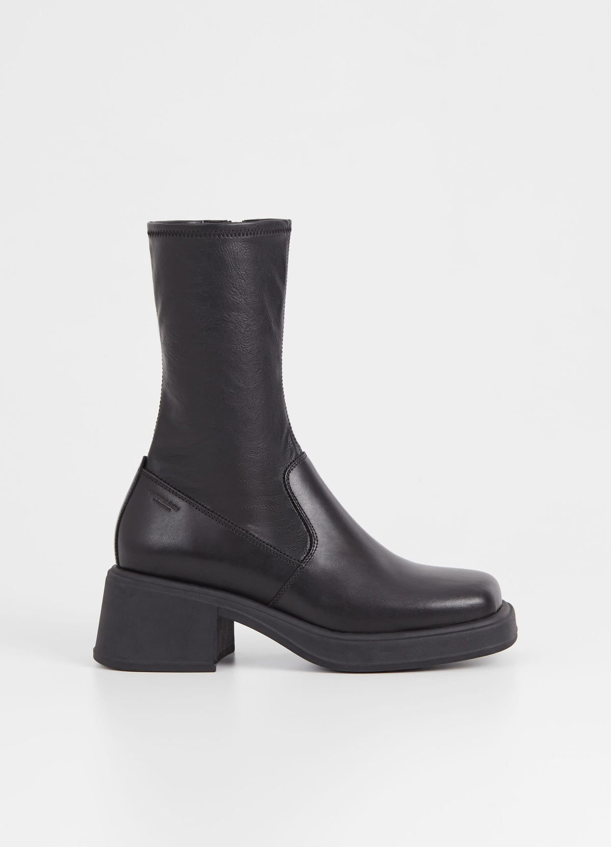 Mid rise leather and synthetic leather boot with chunky moulded sole and heel