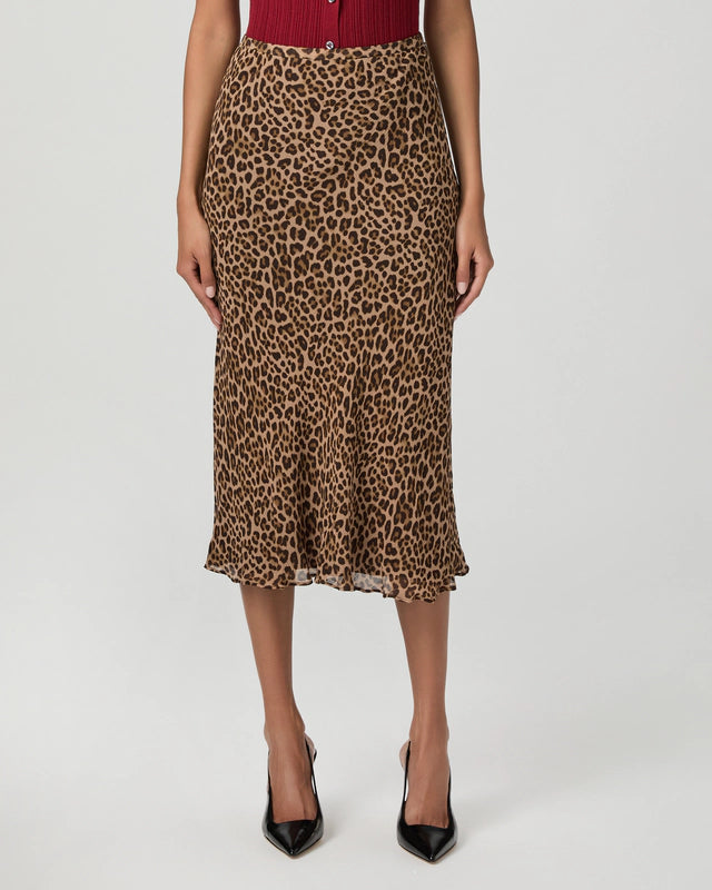 Person wearing a leopard print skirt from Paige