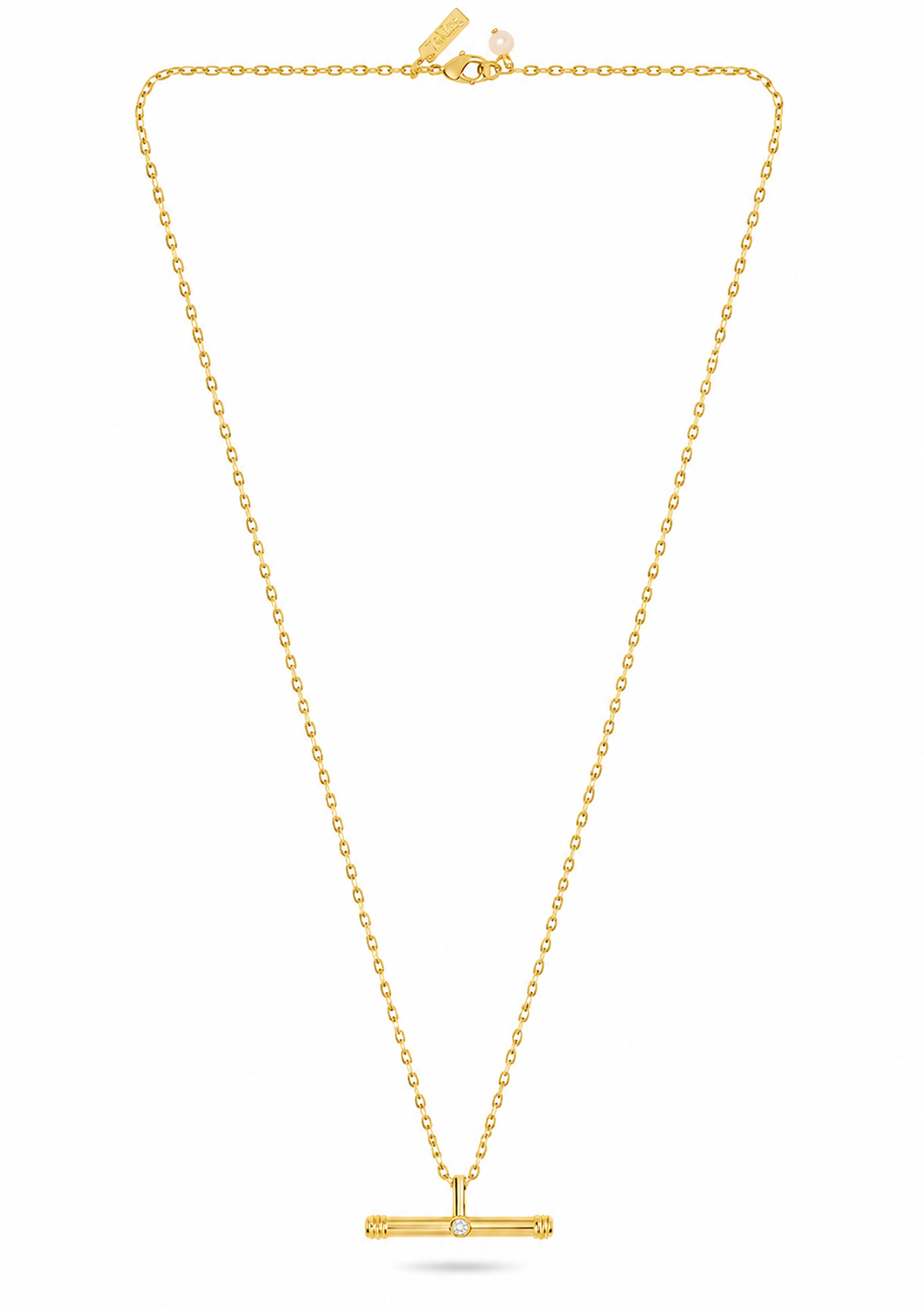 A delicate yellow gold chain necklace with a small horizontal bar pendant featuring a central clear gemstone, displayed on a clean white background.