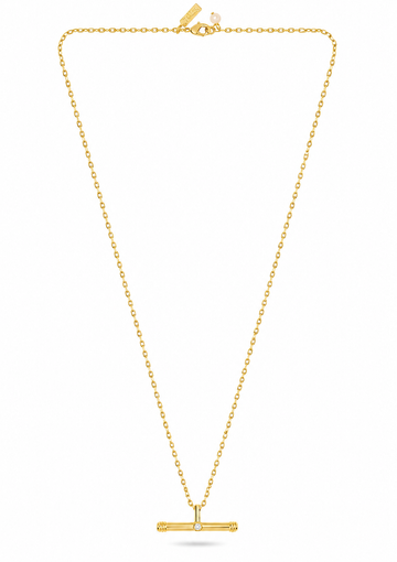 A delicate yellow gold chain necklace with a small horizontal bar pendant featuring a central clear gemstone, displayed on a clean white background.