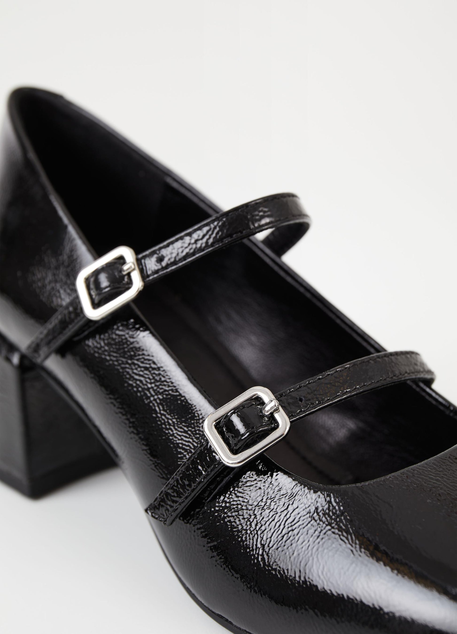 Square toe mary jane shoe with a block heel in black patent leather