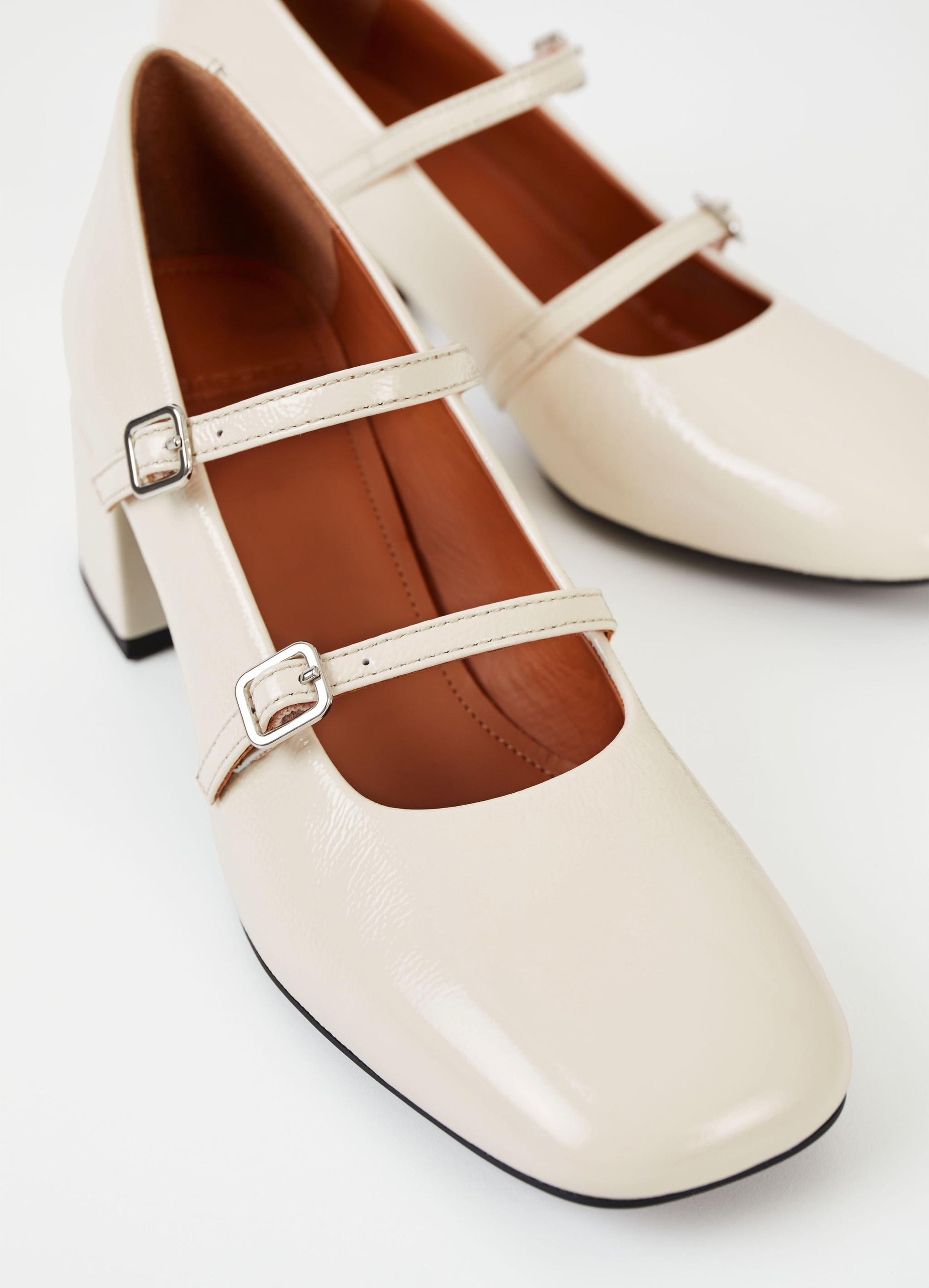 Cream patent mary jane style shoes with block heel and double thin strap