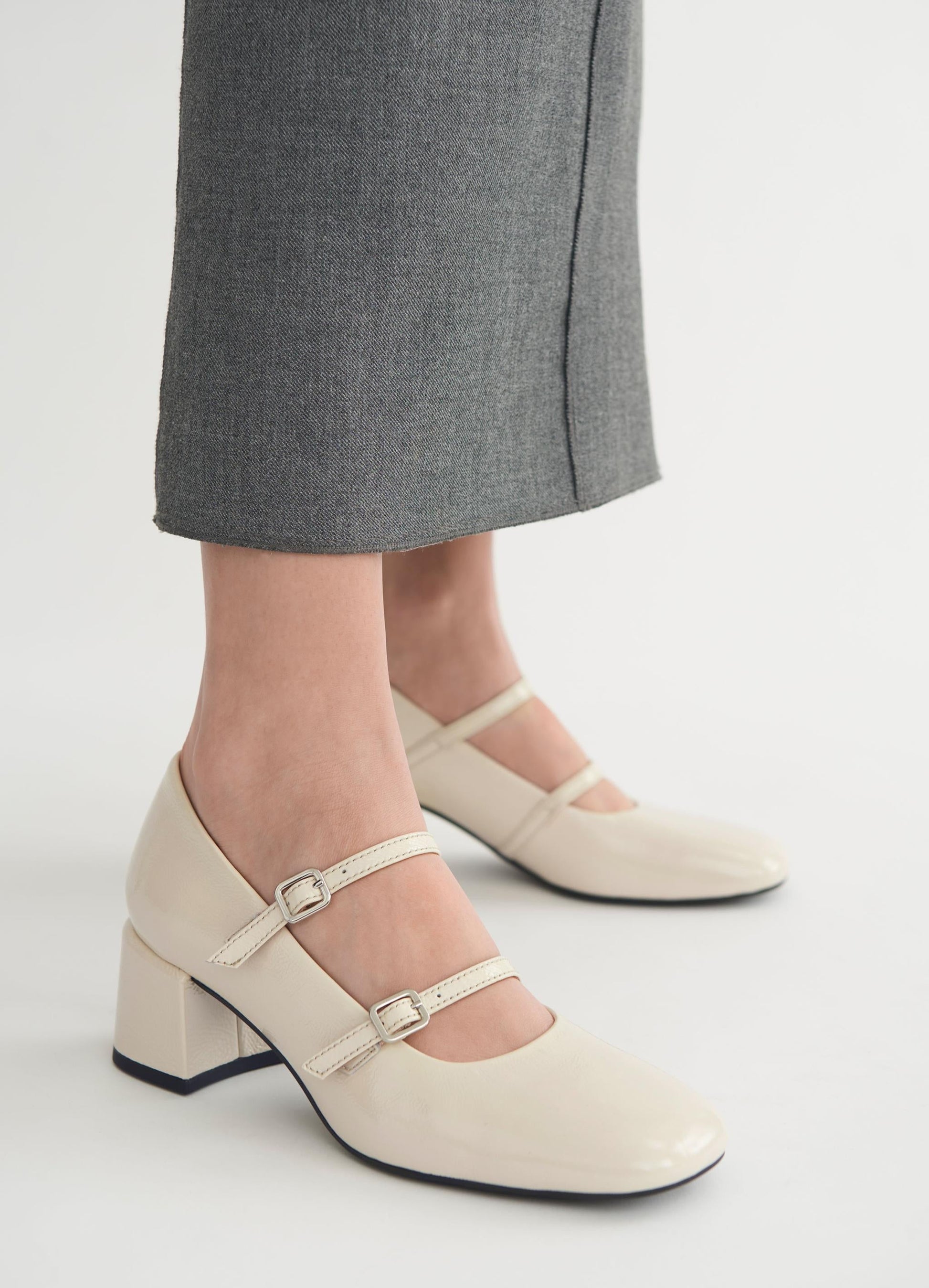 Cream patent mary jane style shoes with block heel and double thin strap