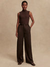 wide leg elasticated waist chocolate brown sateen trousers model shot