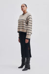 Ecru and black striped jumper with deep crew neck square cut sleeves with deep ribbed cuffs and hem with side splits