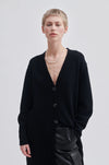 Long black cardigan with V neck. and button fastening