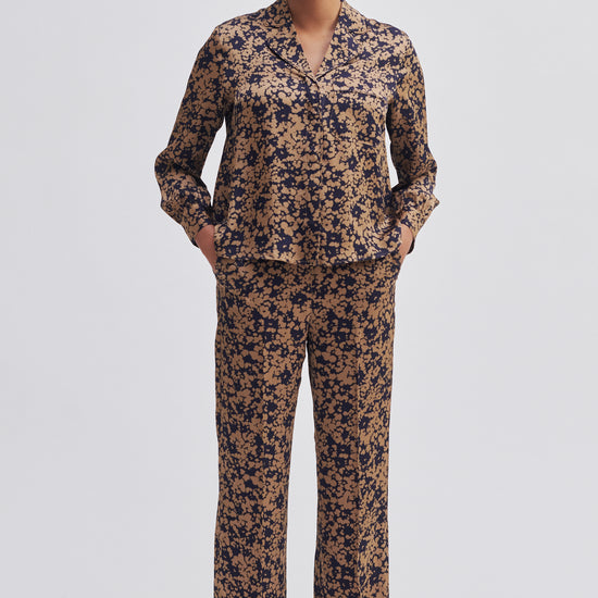 Navy and bronze floral print wide leg trousers with side slant pockets 