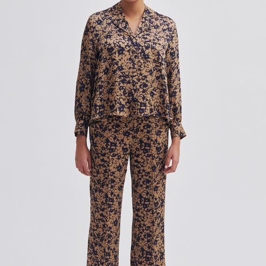 Navy and bronze floral print wide leg trousers with side slant pockets 