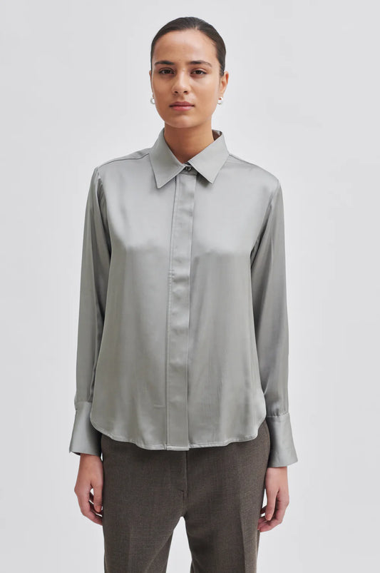 Light grey green satin shirt with classic collar hidden placket long sleeves and rounded dropped hem