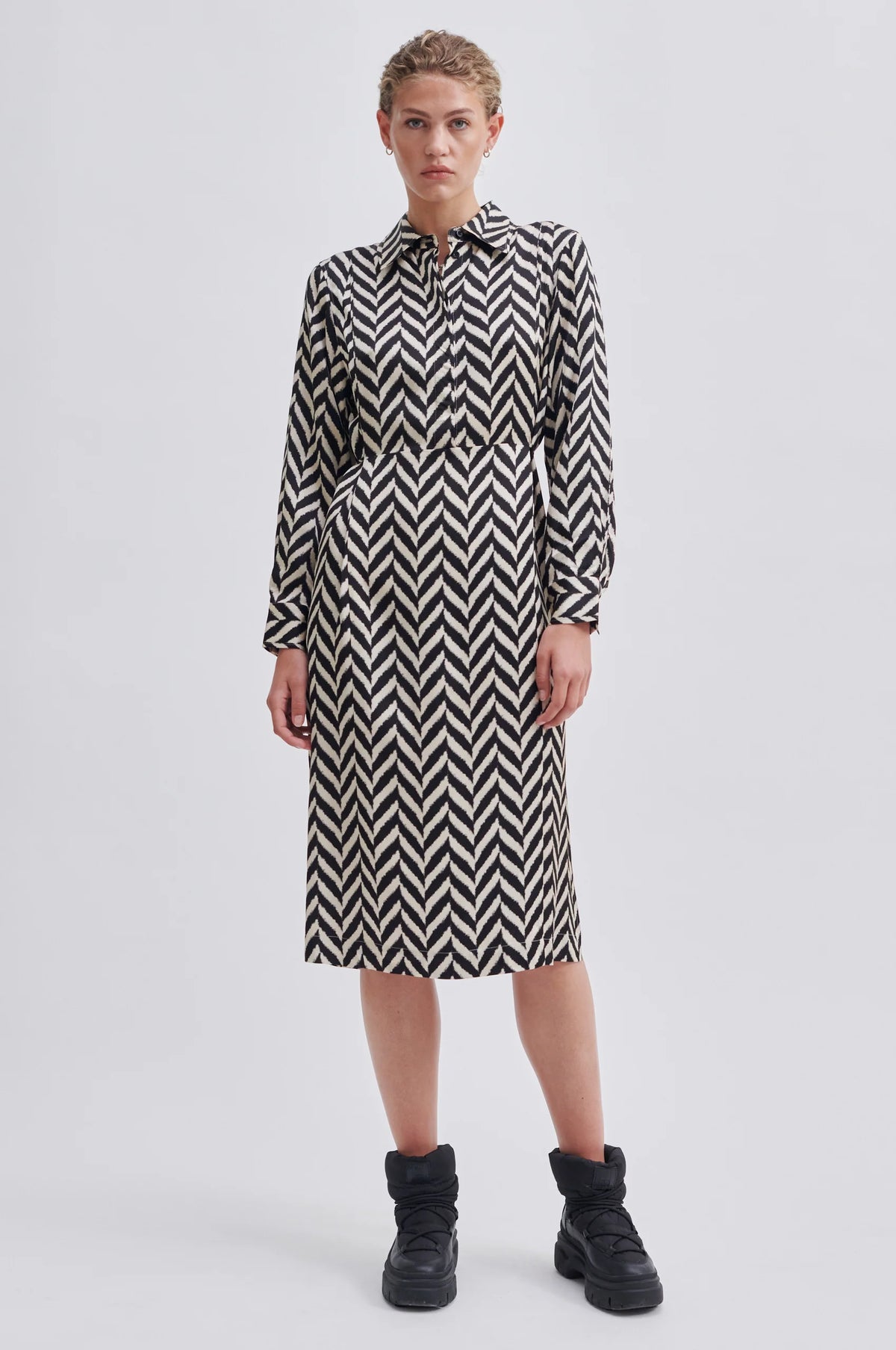 Black and cream chevron print dress with classic collar and long sleeves