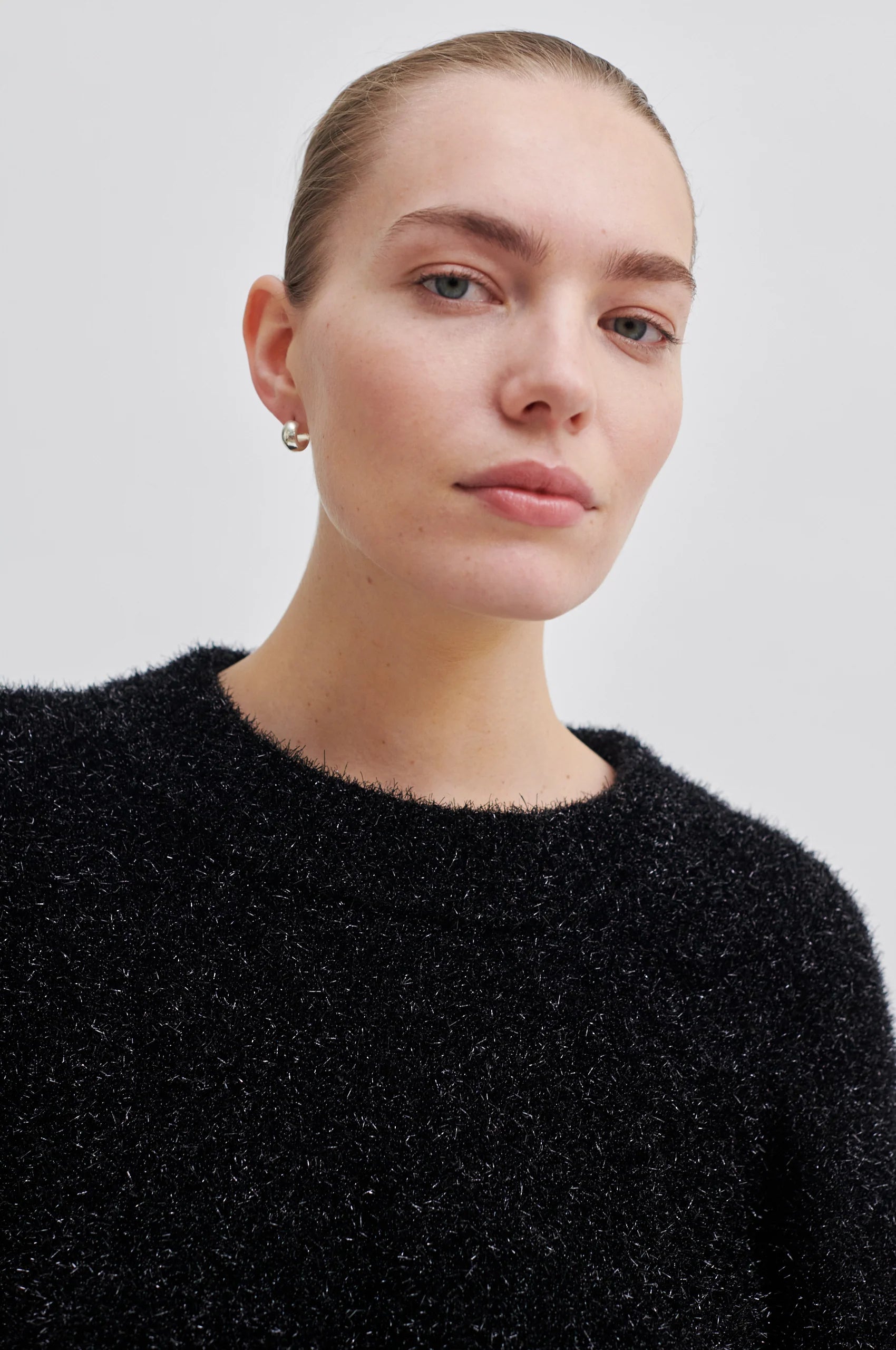 Black sparkly oversized jumper with ribbed neck and cuffs and dropped shoulders